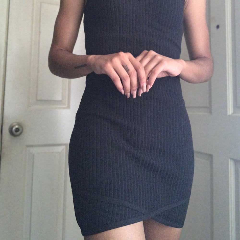 Slim black asymetrical mini dress